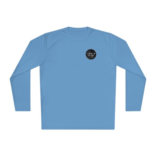 A light blue Unisex Lightweight Long Sleeve Tee with a black circular emblem containing white text on the upper front left side.