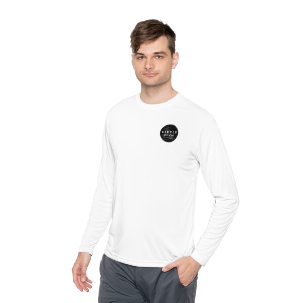 A man wearing a white Unisex Lightweight Long Sleeve Tee with a "Circle of G/L" logo on the left chest and dark gray pants stands against a white background.