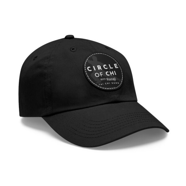 A black Circle of Chi Dad Hat with Leather Patch on the front that reads "Circle of Chi with Rasaji Tai Chi Gung.