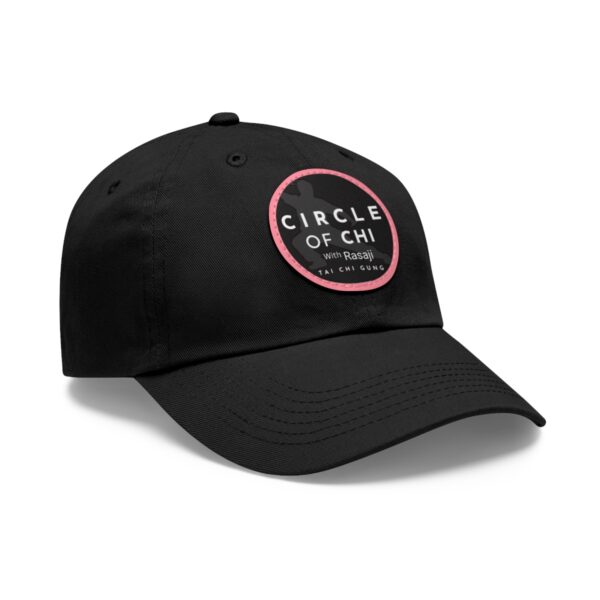 A Circle of Chi Dad Hat with Leather Patch with a pink and white logo that reads "CIRCLE OF CHI with Rasaji TAI CHI GUNG" on the front.