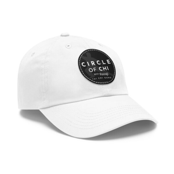 A white Circle of Chi Dad Hat with Leather Patch on the front that reads "CIRCLE OF CHI with Rasaji TAI CHI GUNG.