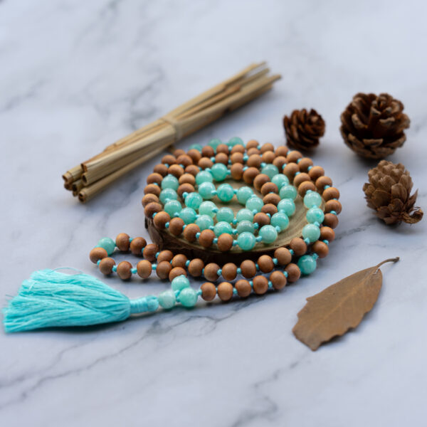 Blue and brown beaded necklace with tassel.